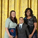 Ian poses with the First Lady and Asborno (left). Photo: Steven E. Purcell